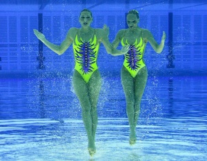 4 upside down synchro swimmers